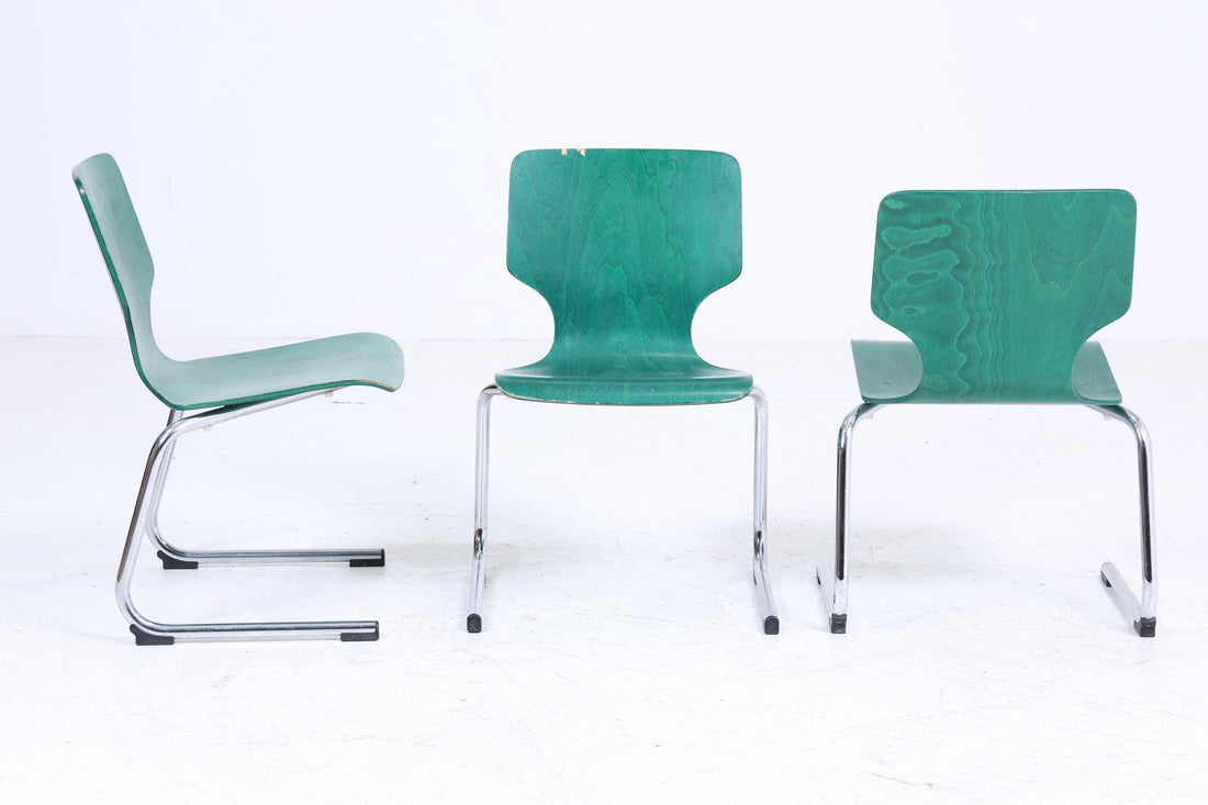 Vintage cantilever chairs | Mid-century design classics | Tubular steel and wood | Retro chair green
